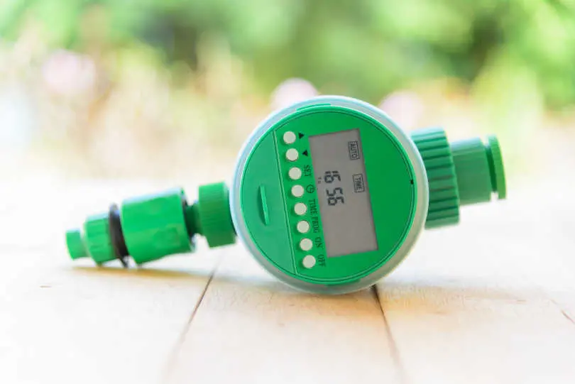 Watering Timer on Wood Plate