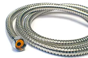 Metal garden hose isolated on the white background